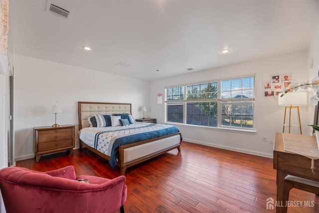 bedroom featuring dark hardwood / wood-style floors