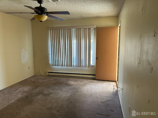 carpeted empty room with a textured ceiling, ceiling fan, and a baseboard radiator