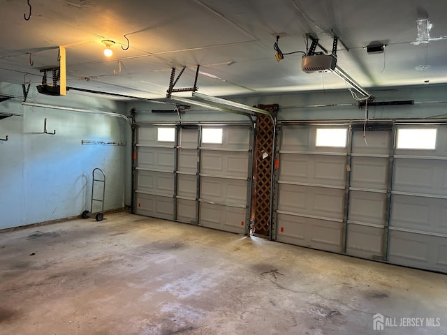 garage featuring a garage door opener