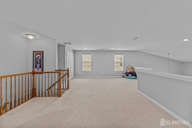 recreation room featuring recessed lighting, carpet flooring, visible vents, and baseboards