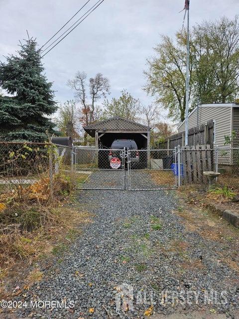 view of yard with a carport