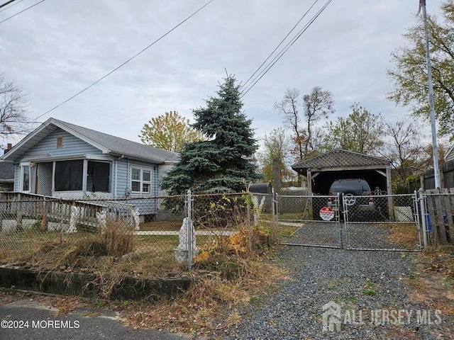 view of home's exterior with a carport