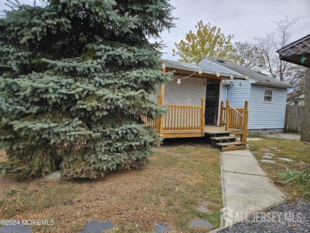 view of front of property with a deck