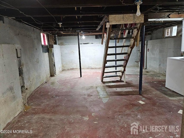 basement with washer / clothes dryer