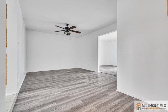 17 Begonia Ct, Sayreville, NJ 08872 - unfurnished room with a ceiling fan and wood finished floors