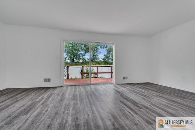 17 Begonia Ct, Sayreville, NJ 08872 - unfurnished room featuring wood finished floors and baseboards