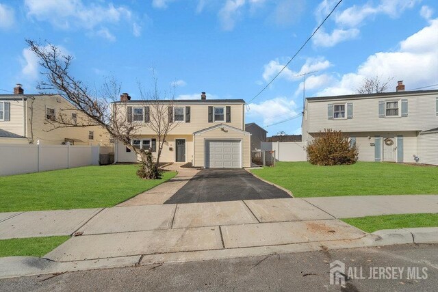 view of front of home with a front lawn