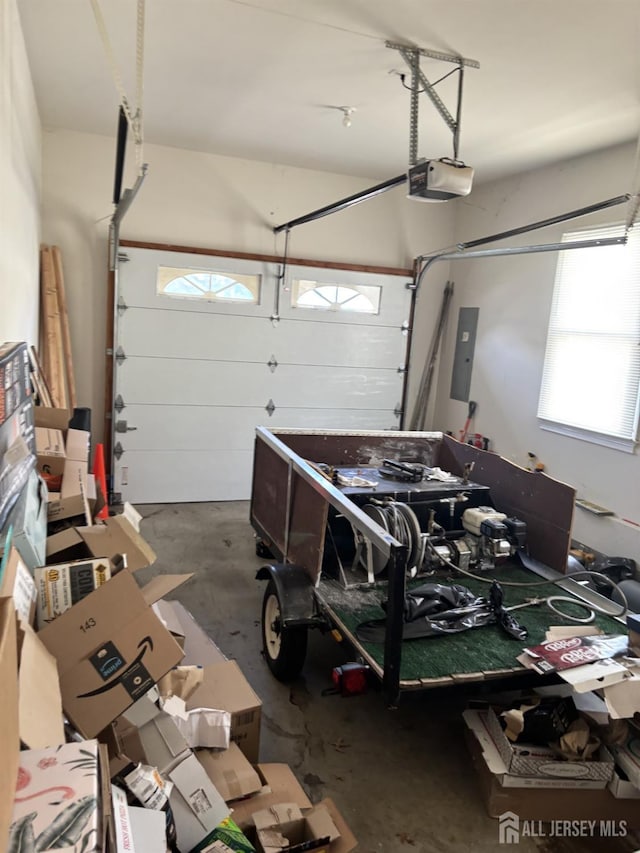 89 Sharot St, Carteret, NJ 07008 - garage with electric panel and a garage door opener