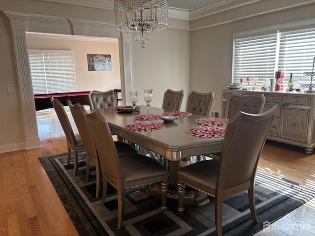 89 Sharot St, Carteret, NJ 07008 - dining room with a chandelier, crown molding, and light wood finished floors