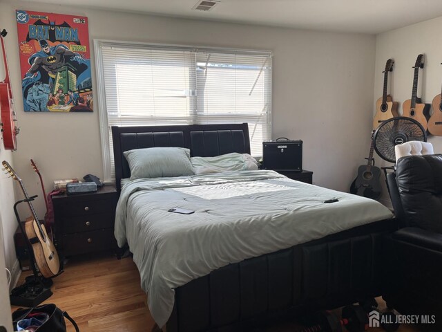 89 Sharot St, Carteret, NJ 07008 - bedroom with light wood-style flooring