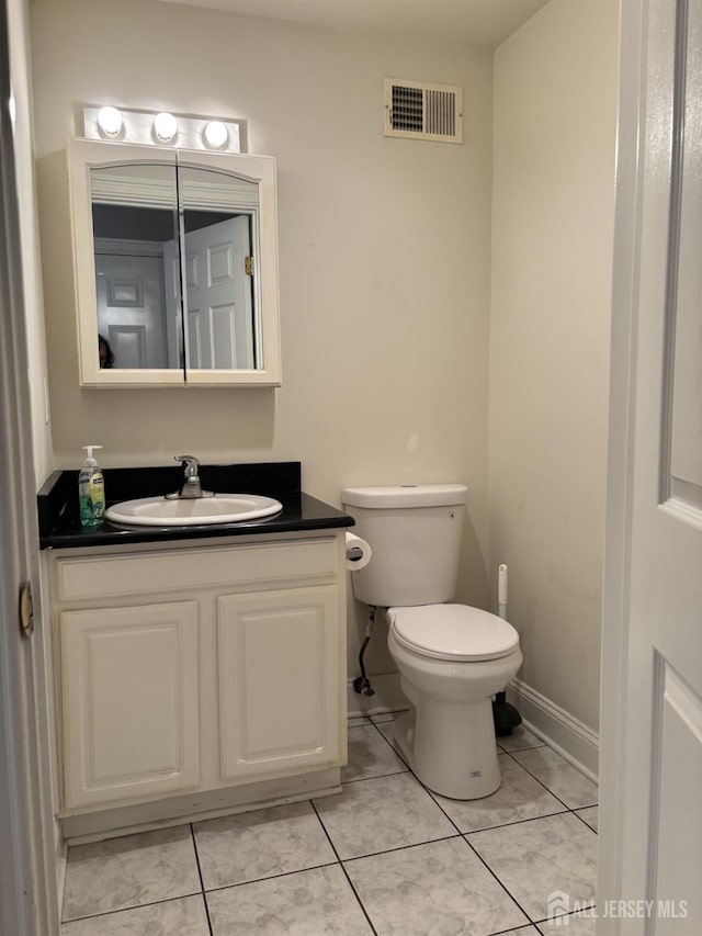 89 Sharot St, Carteret, NJ 07008 - bathroom featuring vanity and tile patterned flooring