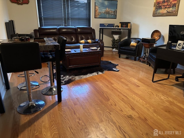 89 Sharot St, Carteret, NJ 07008 - living area with wood finished floors and an office area