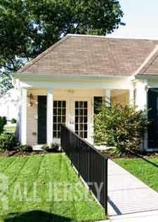30-N Bradford Ln, Monroe, NJ 08831 - rear view of property with an outbuilding and a lawn