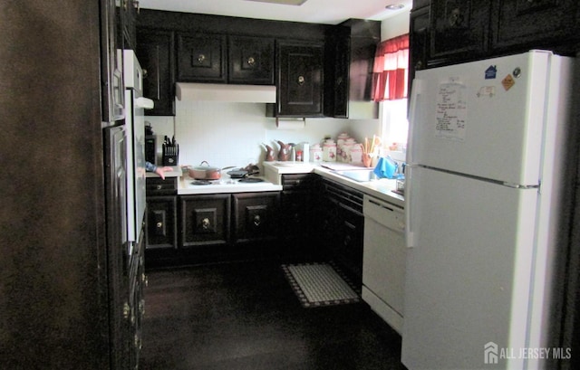 30-N Bradford Ln, Monroe, NJ 08831 - kitchen featuring white appliances, light countertops, under cabinet range hood, and a sink