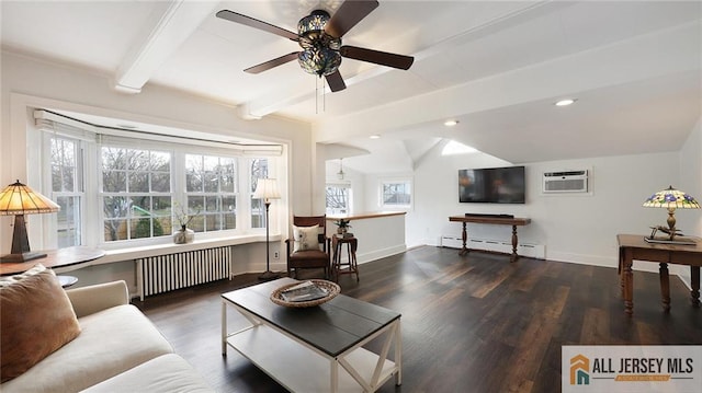 living area featuring radiator heating unit, a ceiling fan, wood finished floors, a baseboard heating unit, and an AC wall unit