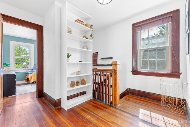54 5th St, Fords, NJ 08863 - hallway featuring hardwood / wood-style flooring and an upstairs landing