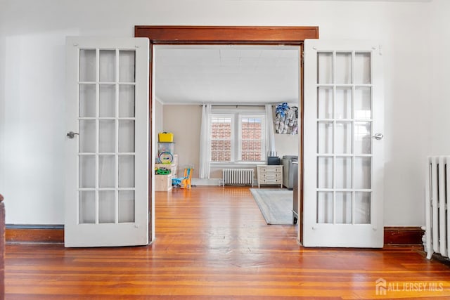 54 5th St, Fords, NJ 08863 - doorway with radiator and wood finished floors
