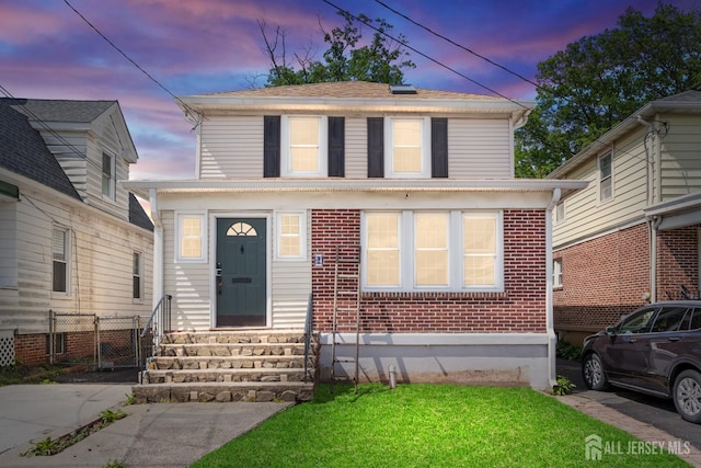54 5th St, Fords, NJ 08863 - view of front of house with entry steps and brick siding