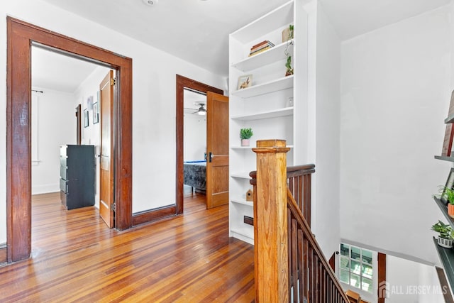 54 5th St, Fords, NJ 08863 - corridor with an upstairs landing and wood finished floors