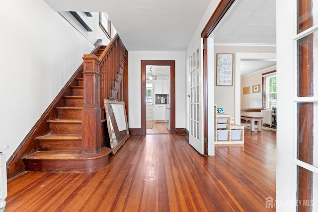 54 5th St, Fords, NJ 08863 - entryway with french doors, stairway, wood finished floors, and ornamental molding