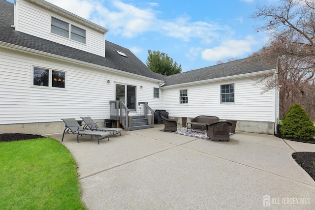 445 Grace Hill Rd, Monroe, NJ 08831 - rear view of house featuring a patio, a yard, and a shingled roof