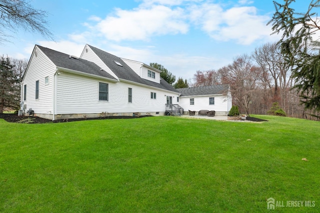 445 Grace Hill Rd, Monroe, NJ 08831 - back of house with a patio area, roof with shingles, and a yard