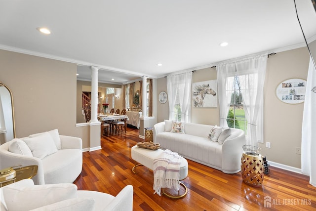 445 Grace Hill Rd, Monroe, NJ 08831 - living room with wood finished floors, ornamental molding, and ornate columns