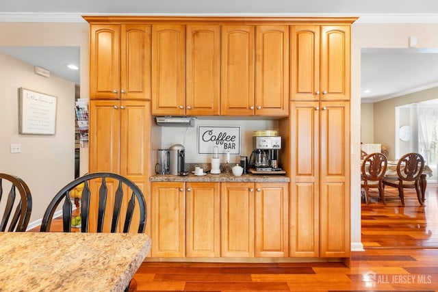 445 Grace Hill Rd, Monroe, NJ 08831 - kitchen with light wood-style flooring, crown molding, and light stone counters