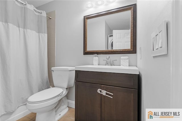 full bathroom with toilet, vanity, shower / bath combo with shower curtain, stacked washer / dryer, and tile patterned flooring