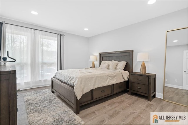 bedroom with light hardwood / wood-style floors