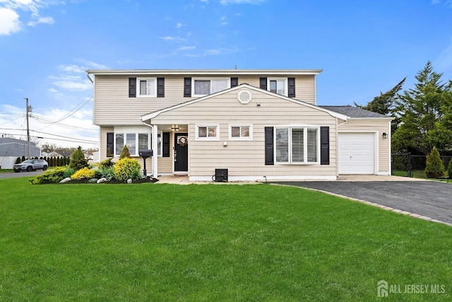 1 York St, Old Bridge, NJ 08857 - view of front facade featuring a garage and driveway