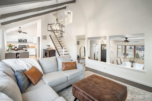 1 York St, Old Bridge, NJ 08857 - living room with ceiling fan, stairway, light wood-style flooring, beam ceiling, and high vaulted ceiling