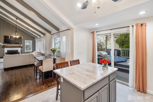 1 York St, Old Bridge, NJ 08857 - kitchen featuring gray cabinets, vaulted ceiling, healthy amount of natural light, open floor plan, and ceiling fan