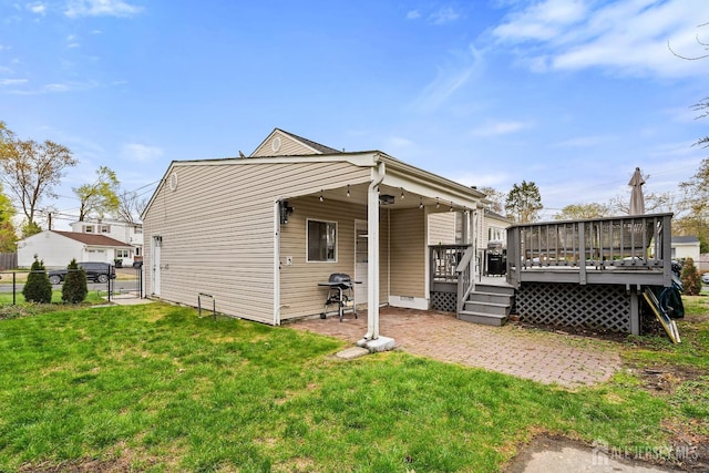 1 York St, Old Bridge, NJ 08857 - rear view of property featuring a deck and a patio