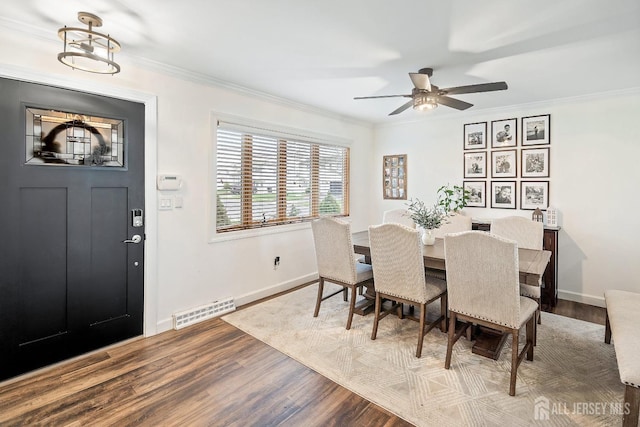 1 York St, Old Bridge, NJ 08857 - dining room with wood finished floors, ornamental molding, baseboards, and ceiling fan