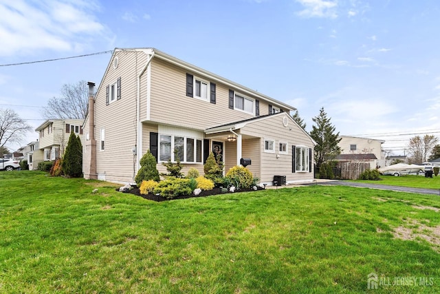 1 York St, Old Bridge, NJ 08857 - view of front of house featuring a front lawn