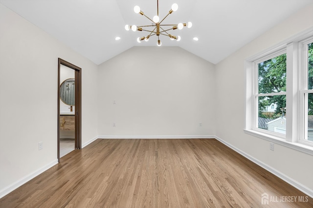35 Glenville Rd, Edison, NJ 08817 - unfurnished living room featuring a chandelier, wood finished floors, recessed lighting, and vaulted ceiling