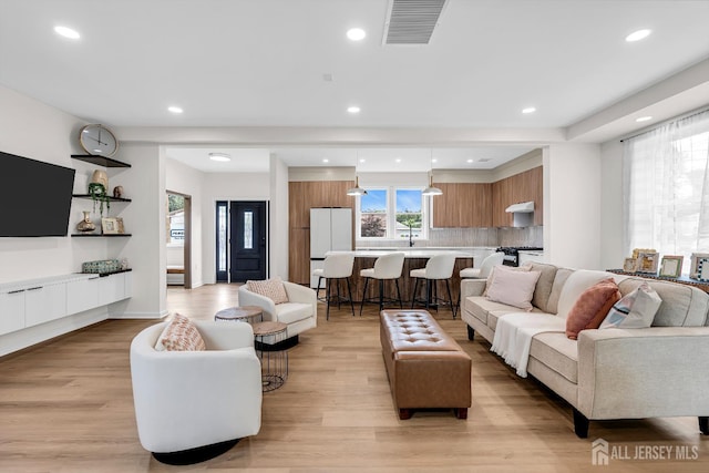 35 Glenville Rd, Edison, NJ 08817 - living room featuring light wood-style flooring and recessed lighting