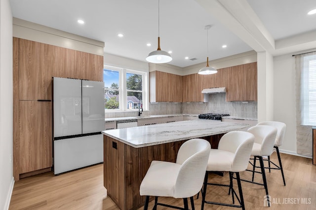 35 Glenville Rd, Edison, NJ 08817 - kitchen featuring white appliances, modern cabinets, a kitchen island, under cabinet range hood, and recessed lighting