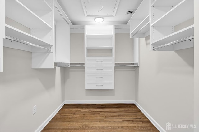 35 Glenville Rd, Edison, NJ 08817 - spacious closet featuring dark wood-type flooring and attic access