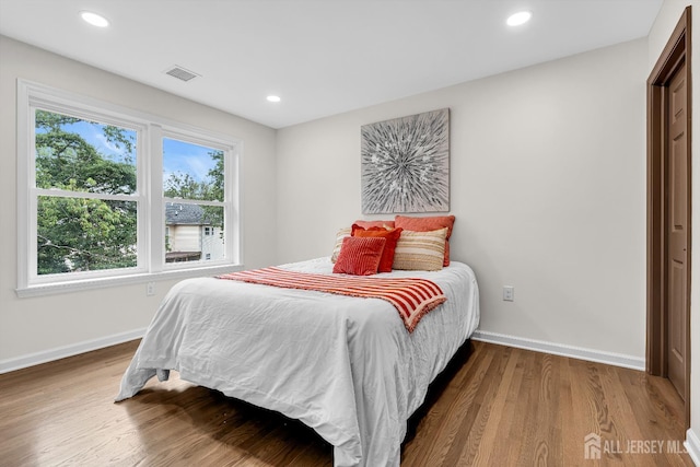 35 Glenville Rd, Edison, NJ 08817 - bedroom with wood finished floors and recessed lighting