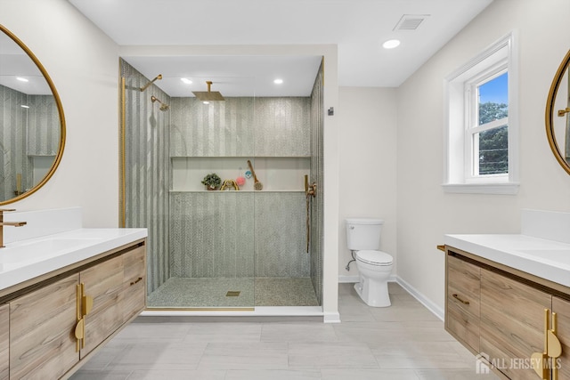 35 Glenville Rd, Edison, NJ 08817 - bathroom featuring a stall shower, two vanities, and recessed lighting