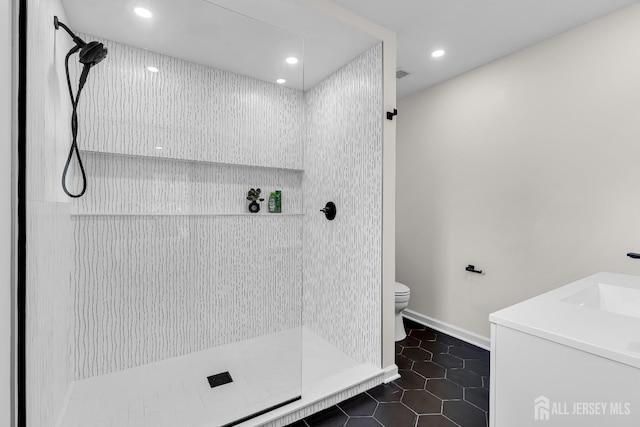 35 Glenville Rd, Edison, NJ 08817 - full bath featuring tiled shower, recessed lighting, tile patterned flooring, and vanity