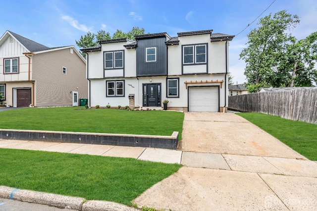 35 Glenville Rd, Edison, NJ 08817 - view of front facade featuring concrete driveway, an attached garage, and stucco siding