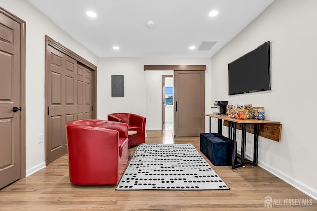 35 Glenville Rd, Edison, NJ 08817 - living area with electric panel, light wood-style floors, and recessed lighting