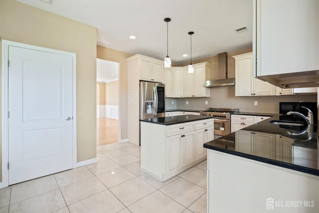 120 Normandy Rd, Colonia, NJ 07067 - kitchen with wall chimney range hood, stainless steel appliances, a sink, dark countertops, and a center island