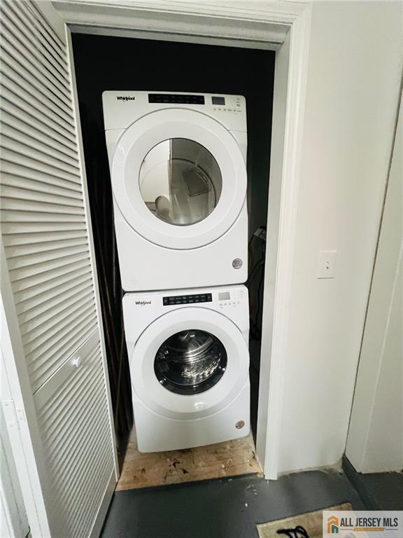 97 Ford Ave, Fords, NJ 08863 - laundry room with laundry area and stacked washer and dryer