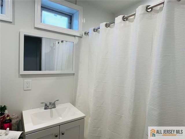 97 Ford Ave, Fords, NJ 08863 - bathroom featuring vanity and a shower with curtain
