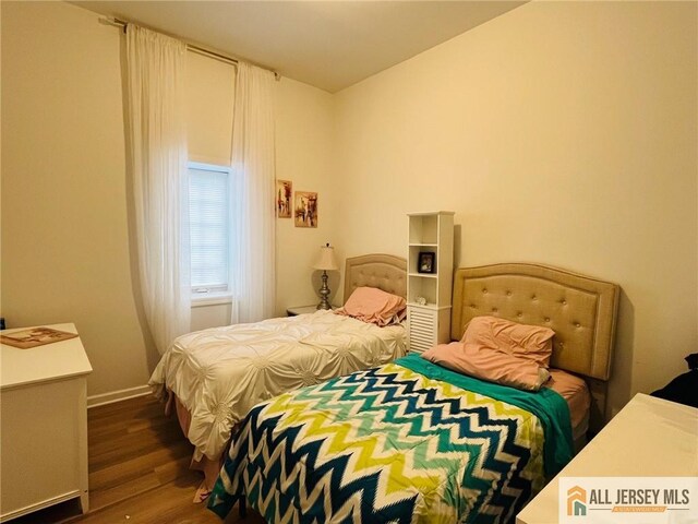 97 Ford Ave, Fords, NJ 08863 - bedroom with wood finished floors and baseboards