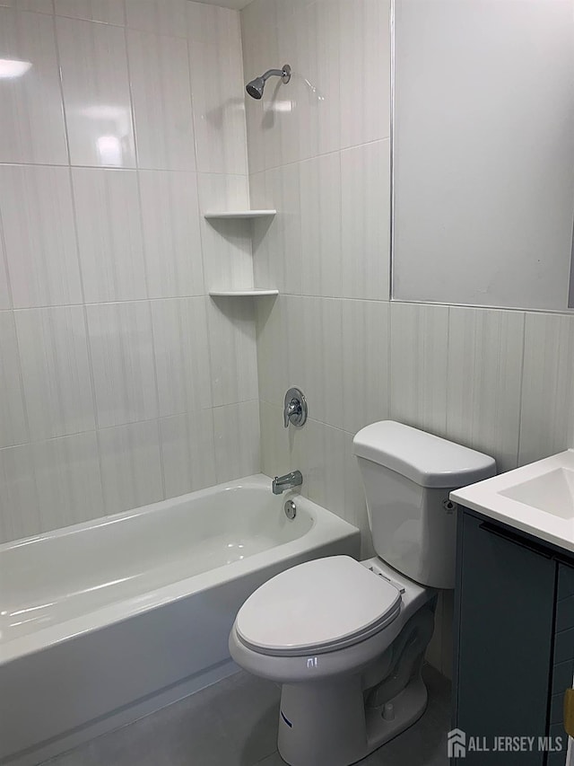 full bathroom with tub / shower combination, toilet, and vanity